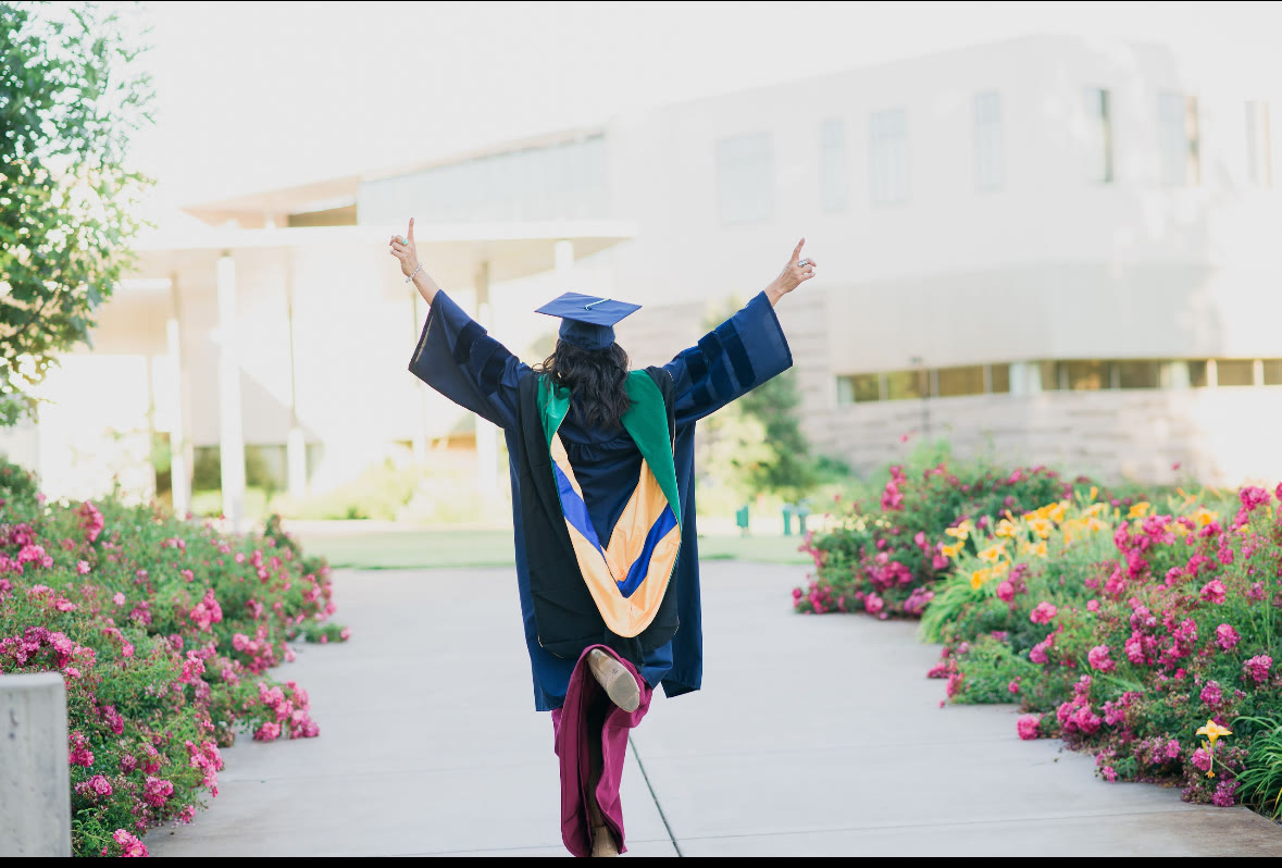 Dr. Gigi Magan celebrating on graduation day