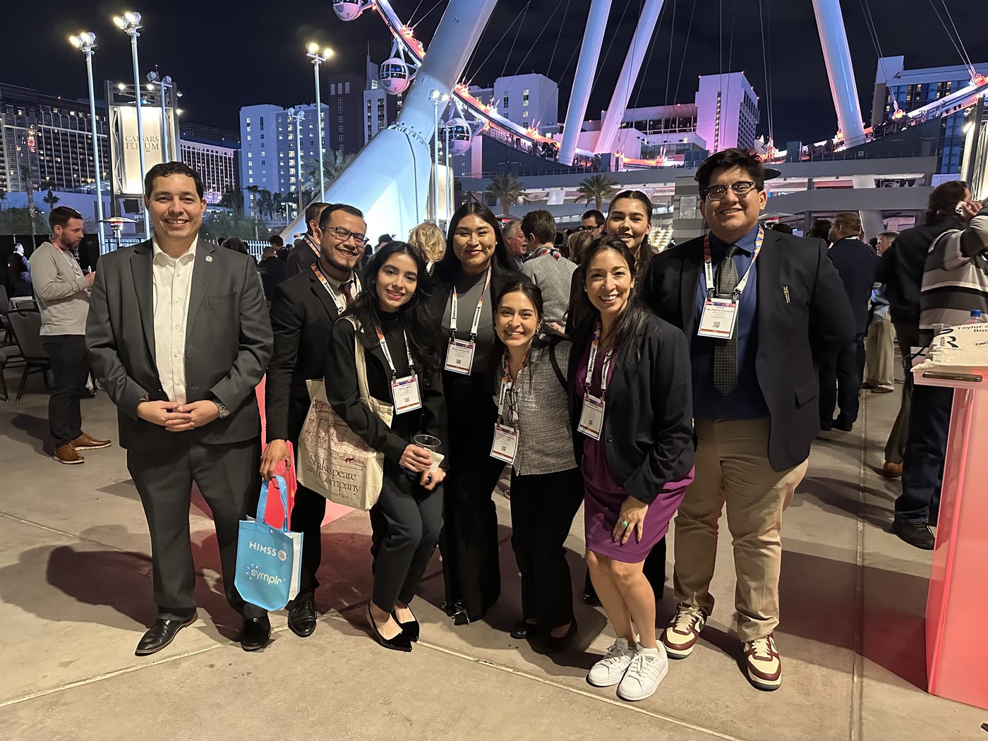 Dr. Gigi Magan with colleagues at a conference